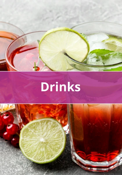 Refreshing colorful drinks in glasses with lime, berries, and ice cubes – perfect summer beverages.