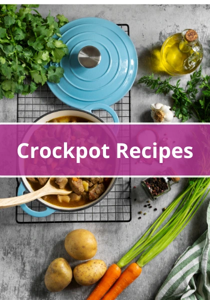 Blue Dutch oven filled with hearty beef and vegetable stew surrounded by fresh carrots, potatoes, herbs, garlic, and olive oil.