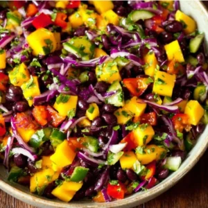 Colorful Black Bean Mango Salad with fresh ingredients in a bowl.