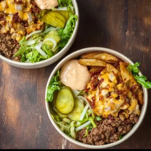 Delicious burger bowls with fresh ingredients in a vibrant bowl