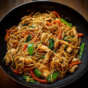 Delicious plate of Chicken Lo Mein with tender chicken and colorful vegetables