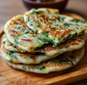 Crispy Chinese scallion pancakes served on a plate