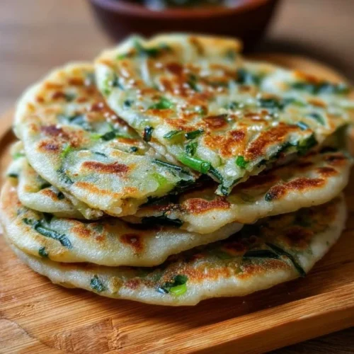 Crispy Chinese scallion pancakes served on a plate