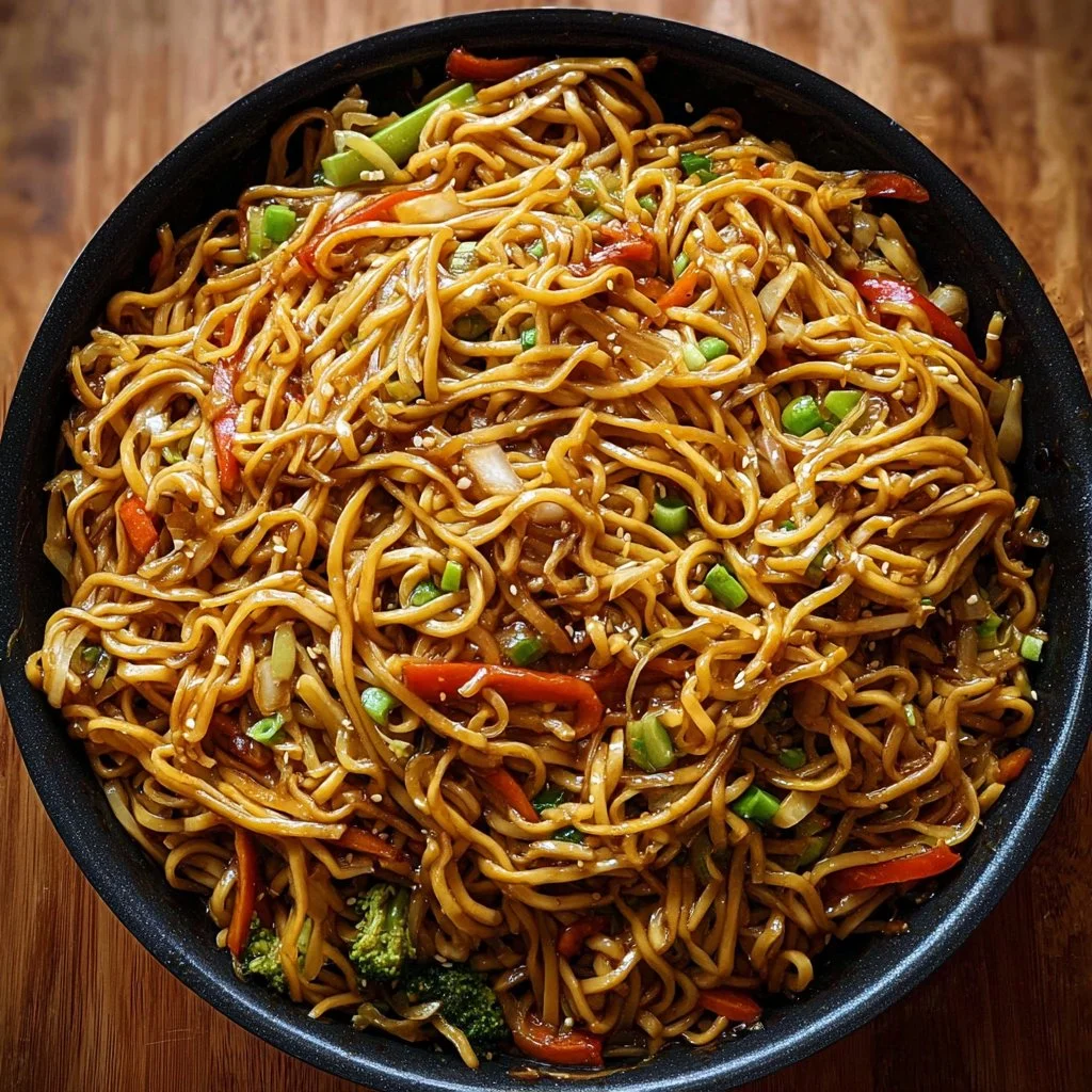 Bowl of teriyaki noodles with vegetables and sesame seeds