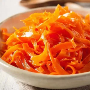 Fermented carrots showcased in a pickled carrot salad with shaved carrots