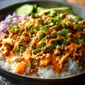 Ground turkey rice bowls topped with spicy Bang Bang sauce