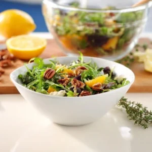 Harvest salad topped with lemon thyme dressing and seasonal vegetables.