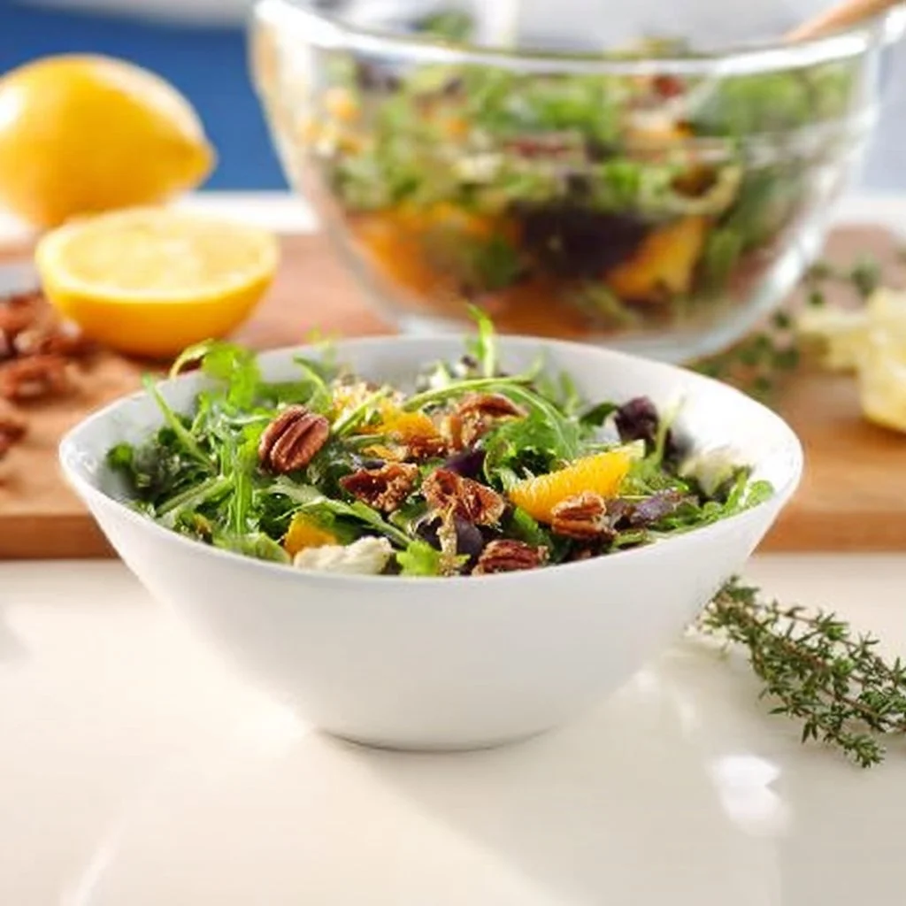 Harvest salad topped with lemon thyme dressing and seasonal vegetables.